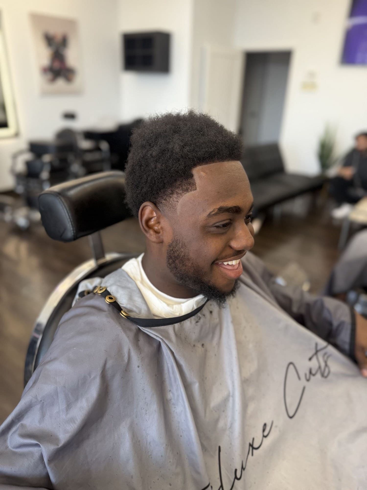 Clean shape-up on a curly top