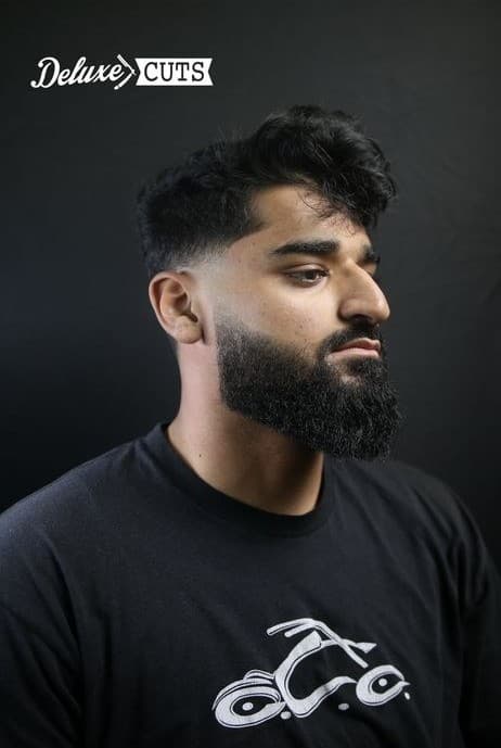 Textured top with a faded beard